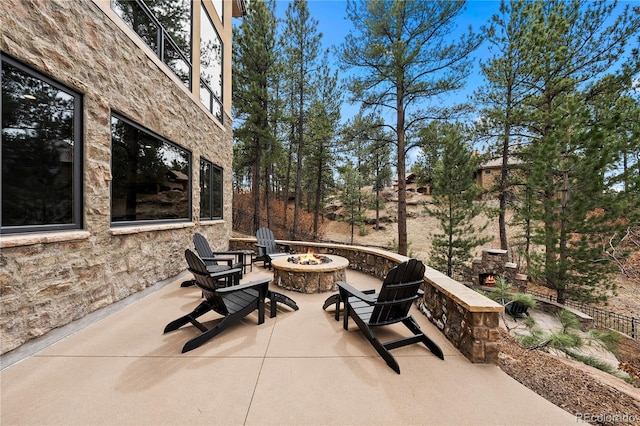 662 Yankakee Dr, Castle Rock, CO 80108 - view of patio featuring an outdoor fire pit