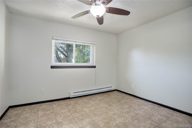 empty room with a baseboard radiator, a textured ceiling, and baseboards