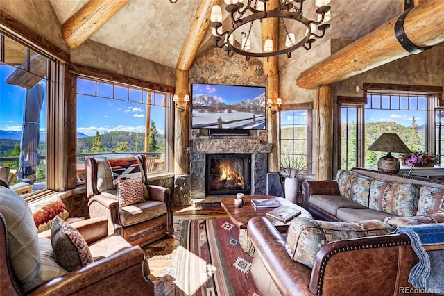 living room featuring lofted ceiling with beams, a wealth of natural light, and a fireplace