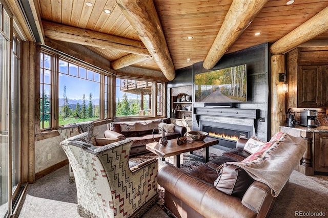 sunroom / solarium featuring beam ceiling and wooden ceiling