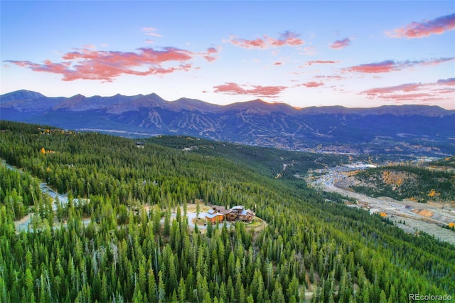 view of mountain feature with a view of trees