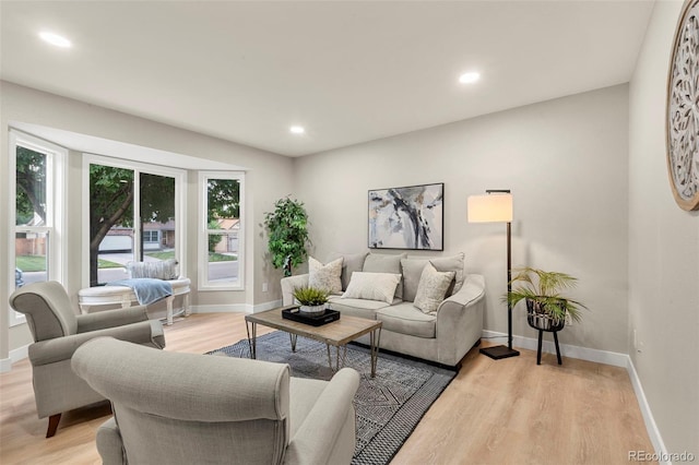 11260 W Fremont Ave, Littleton, CO 80127 - living area featuring light wood-style flooring and recessed lighting