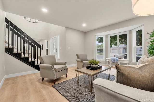 11260 W Fremont Ave, Littleton, CO 80127 - living room with light wood-type flooring, stairs, and recessed lighting