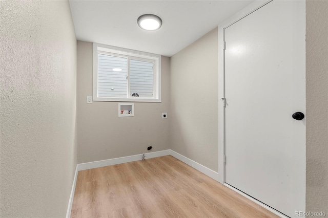 11260 W Fremont Ave, Littleton, CO 80127 - washroom with hookup for a washing machine, light wood finished floors, and electric dryer hookup