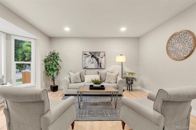 11260 W Fremont Ave, Littleton, CO 80127 - living area featuring light wood finished floors and recessed lighting
