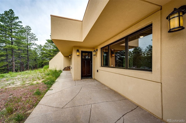 24130 High Timber Ln, Agate, CO 80101 - entrance to property featuring stucco siding