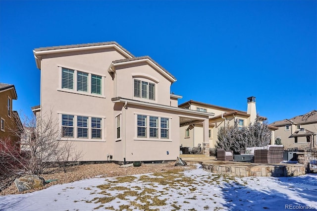 view of snow covered property