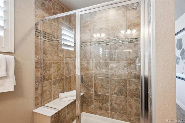 bathroom featuring an enclosed shower