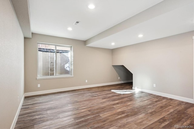 unfurnished living room featuring hardwood / wood-style floors