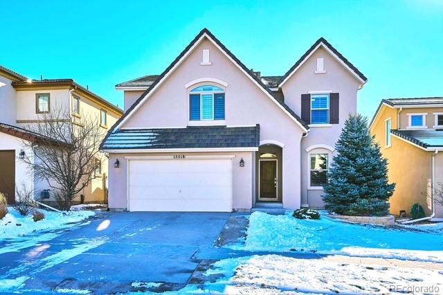 view of front of house with a garage