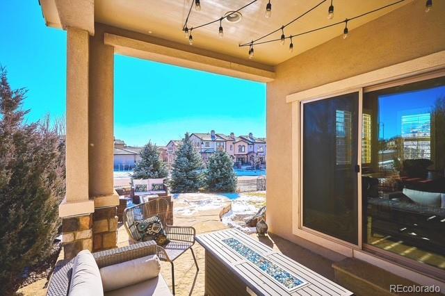 view of patio / terrace featuring an outdoor living space with a fire pit