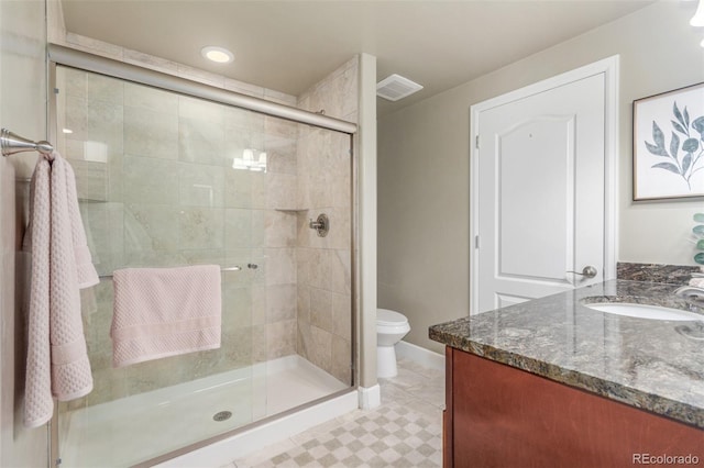 6400 S Ider St, Aurora, CO 80016 - bathroom featuring vanity and a shower stall