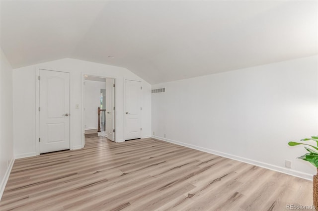 6400 S Ider St, Aurora, CO 80016 - bonus room with light wood-style flooring and lofted ceiling