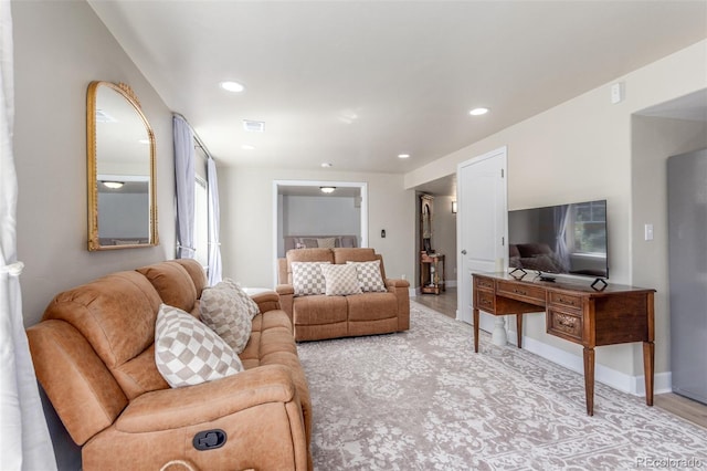 6400 S Ider St, Aurora, CO 80016 - living room featuring recessed lighting and light wood finished floors