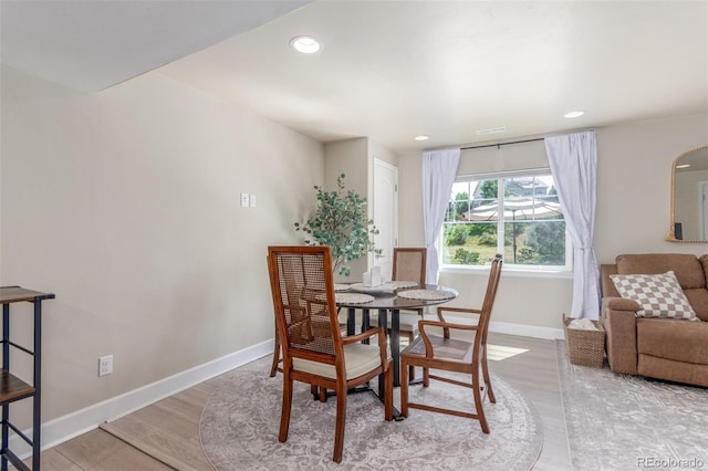 6400 S Ider St, Aurora, CO 80016 - dining area featuring light wood finished floors and recessed lighting