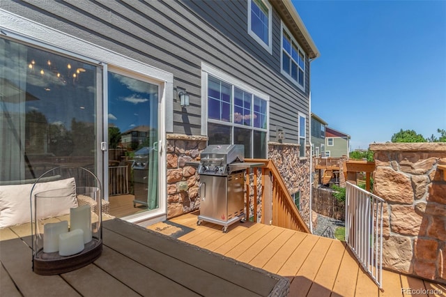 6400 S Ider St, Aurora, CO 80016 - wooden terrace featuring area for grilling