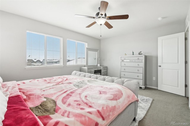 bedroom featuring light carpet and ceiling fan