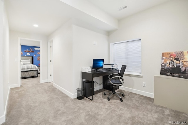 office space with light colored carpet