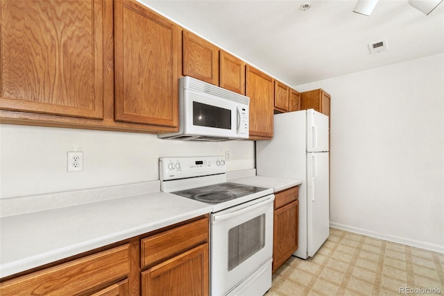 kitchen featuring white appliances