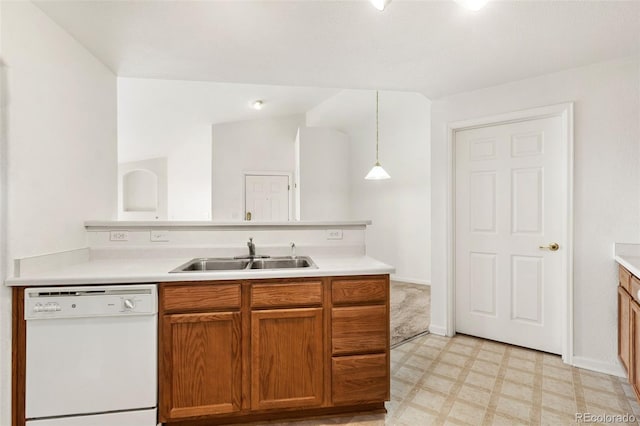 kitchen featuring hanging light fixtures, dishwasher, lofted ceiling, and sink