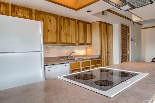 2710 Ryan Gulch Rd Unit 2714, Silverthorne, CO 80498 - kitchen featuring white appliances, brown cabinets, and light countertops