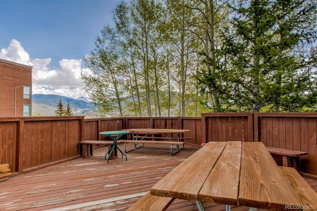 2710 Ryan Gulch Rd Unit 2714, Silverthorne, CO 80498 - deck with outdoor dining area and a mountain view