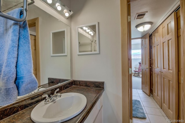 2710 Ryan Gulch Rd Unit 2714, Silverthorne, CO 80498 - bathroom featuring vanity and tile patterned floors
