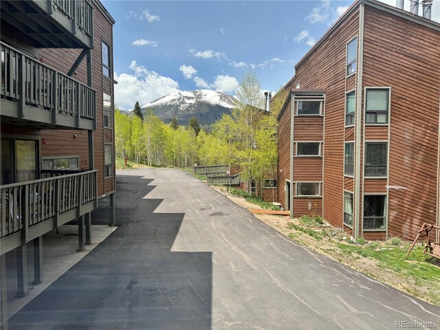 2710 Ryan Gulch Rd Unit 2714, Silverthorne, CO 80498 - view of asphalt road featuring a mountain view