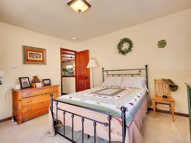 13012 S Wamblee Valley Rd, Conifer, CO 80433 - bedroom with light colored carpet and baseboards