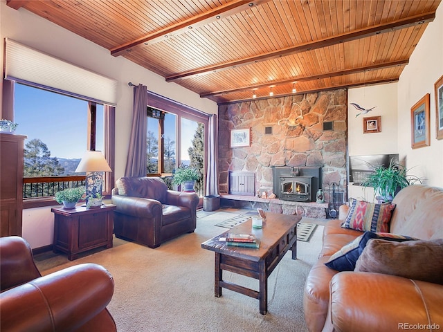 13012 S Wamblee Valley Rd, Conifer, CO 80433 - carpeted living area with wooden ceiling with exposed beams
