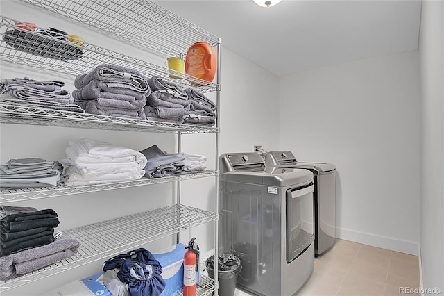 79 Beaver Rd, Idaho Springs, CO 80452 - washroom with independent washer and dryer and baseboards