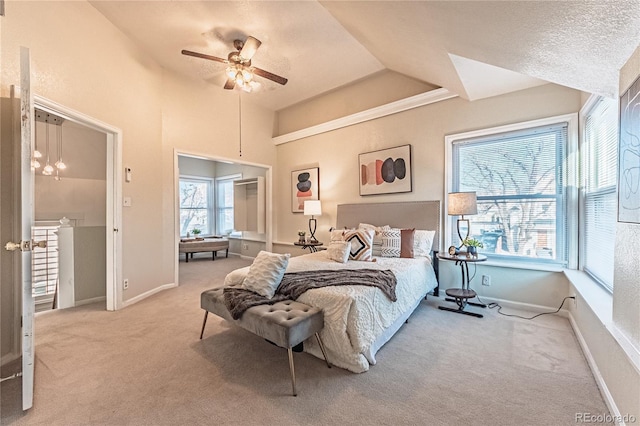 bedroom featuring vaulted ceiling, ceiling fan, baseboards, and carpet floors