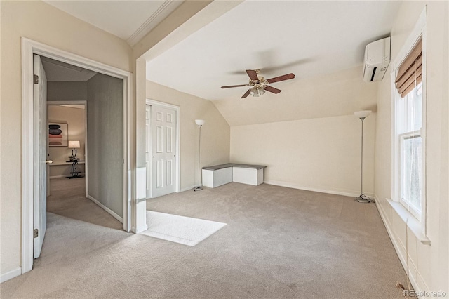 bonus room with a wall unit AC, baseboards, ceiling fan, vaulted ceiling, and carpet flooring