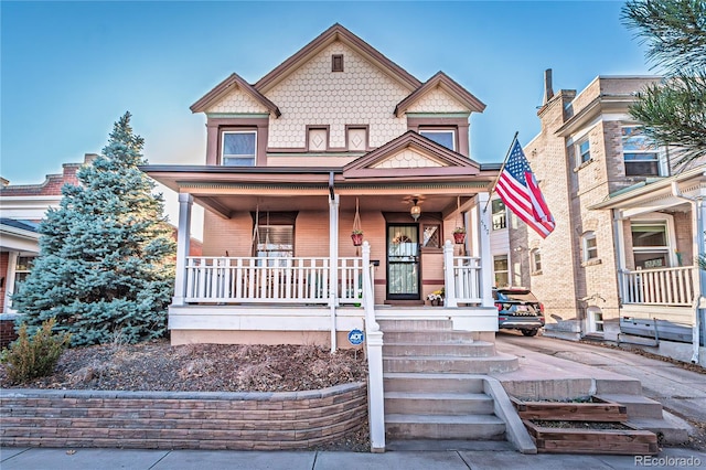 victorian home featuring covered porch