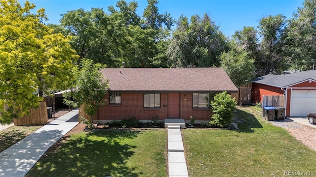 9300 W 53rd Ave, Arvada, CO 80002 - single story home featuring brick siding, roof with shingles, and concrete driveway