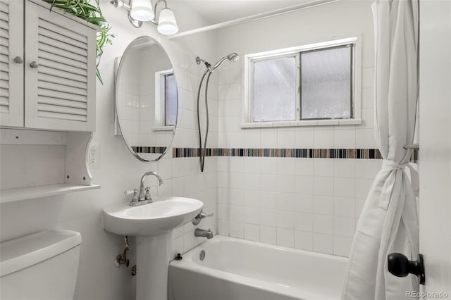 9300 W 53rd Ave, Arvada, CO 80002 - bathroom featuring shower / bath combo and toilet