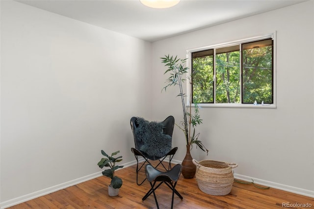 9300 W 53rd Ave, Arvada, CO 80002 - living area featuring baseboards and wood finished floors