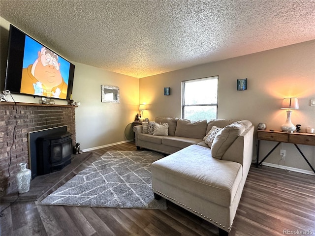 living room featuring dark hardwood / wood-style floors, a wood stove, and a textured ceiling