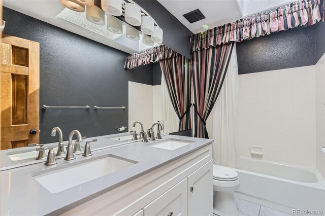 7043 S Owens Way, Littleton, CO 80127 - bathroom with double vanity, shower / tub combo, and tile patterned flooring