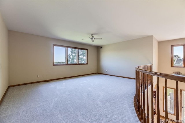 7043 S Owens Way, Littleton, CO 80127 - empty room with ceiling fan and light colored carpet