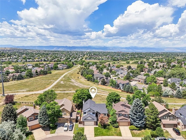 7311 Rattlesnake Dr, Lone Tree, CO 80124 - aerial view of residential area featuring a mountainous background