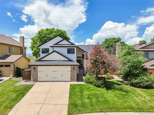7311 Rattlesnake Dr, Lone Tree, CO 80124 - view of front of property with brick siding, driveway, and a front lawn
