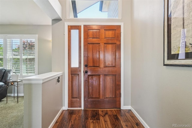 7311 Rattlesnake Dr, Lone Tree, CO 80124 - foyer featuring baseboards and dark wood-style floors