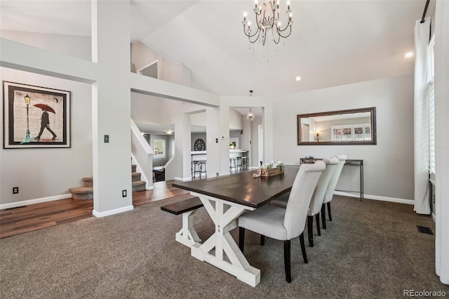 7311 Rattlesnake Dr, Lone Tree, CO 80124 - dining space with carpet flooring, stairway, recessed lighting, a chandelier, and high vaulted ceiling