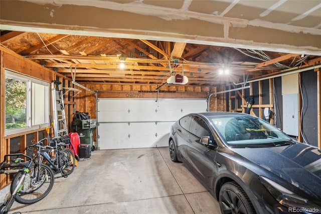 7311 Rattlesnake Dr, Lone Tree, CO 80124 - garage featuring electric panel and a garage door opener
