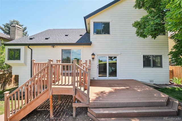 7311 Rattlesnake Dr, Lone Tree, CO 80124 - rear view of house with a shingled roof, a wooden deck, and stairway