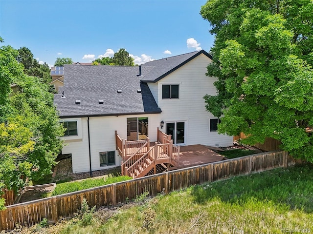 7311 Rattlesnake Dr, Lone Tree, CO 80124 - back of house featuring a deck and roof with shingles