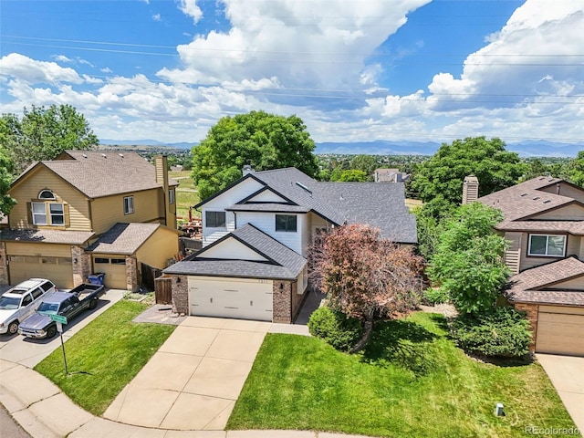 7311 Rattlesnake Dr, Lone Tree, CO 80124 - view of front facade featuring concrete driveway, brick siding, a residential view, a front yard, and a garage