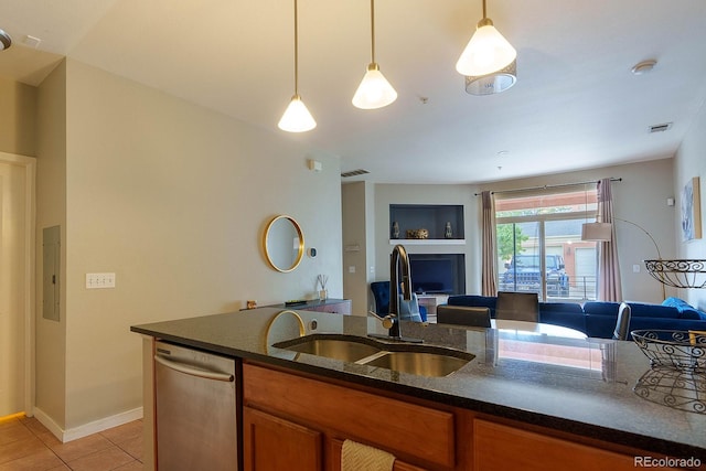 kitchen featuring stainless steel dishwasher, sink, pendant lighting, light tile patterned floors, and electric panel