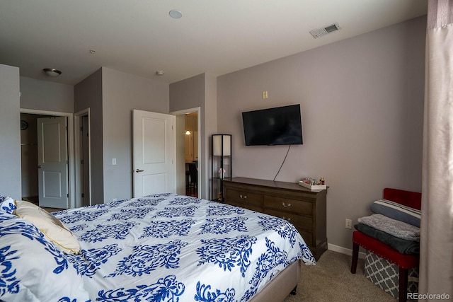 bedroom featuring light carpet